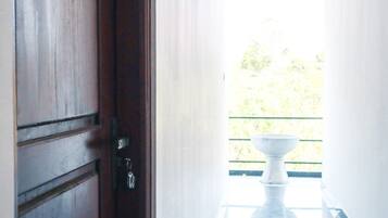 Deluxe Double Room, Balcony, Mountain View | Living area | 32-inch flat-screen TV with satellite channels