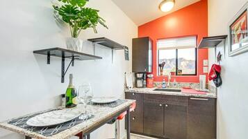 Fridge, microwave, cookware/dishes/utensils, spices