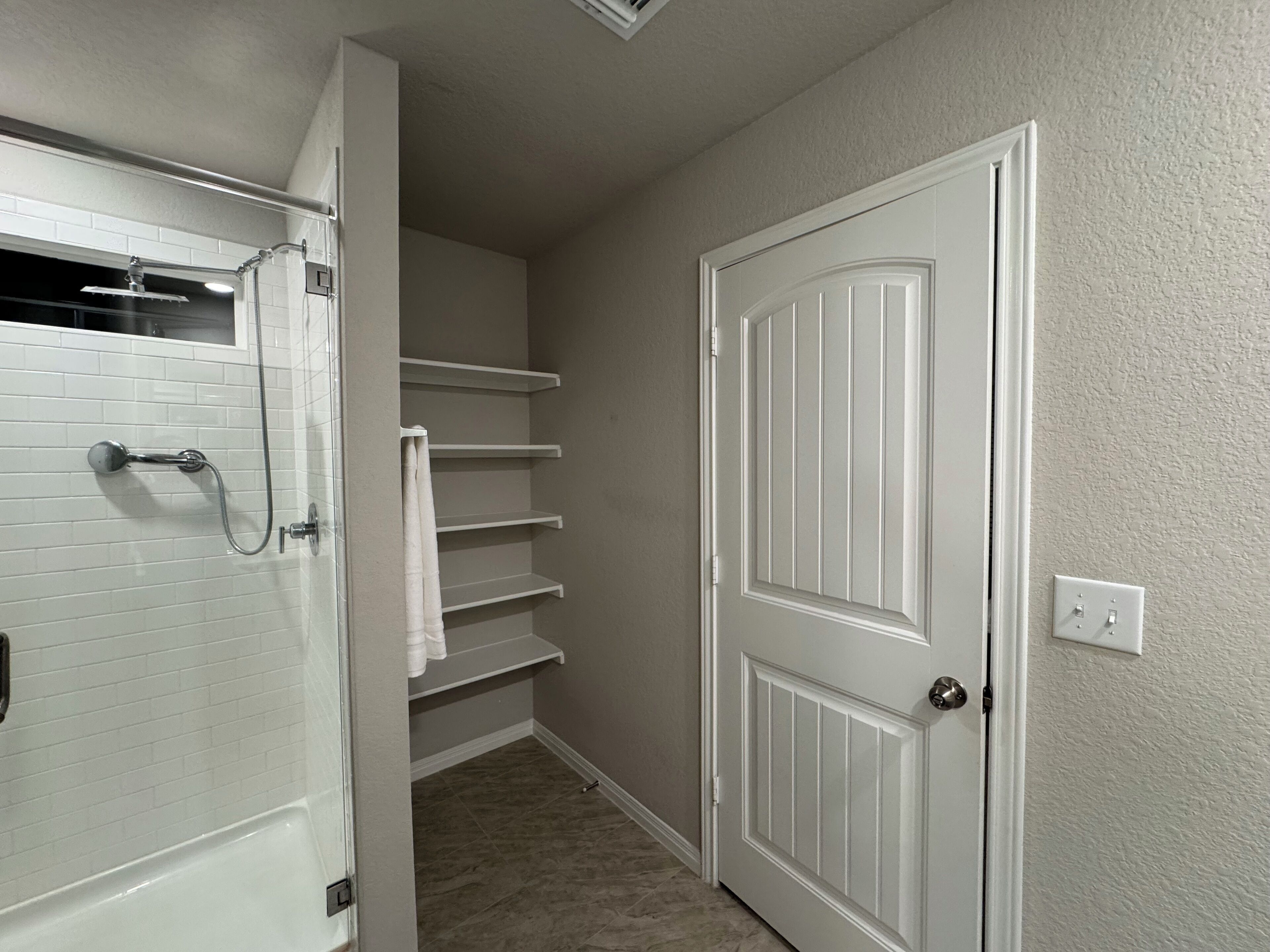 Shower, towels, soap, toilet paper