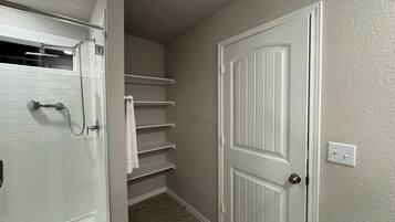 Shower, towels, soap, toilet paper