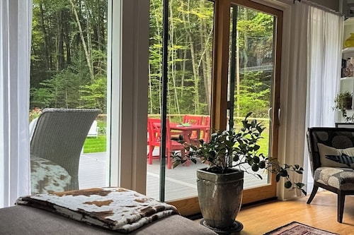 Peaceful riverfront house, dog-friendly, woodstove, decks, bbq, firepit, dock