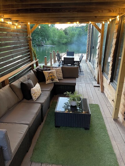 Unplug and unwind in this charming loft cabin nestled on the water’s edge.