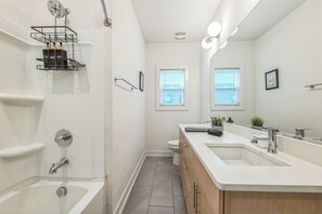 Shower, towels, soap, toilet paper