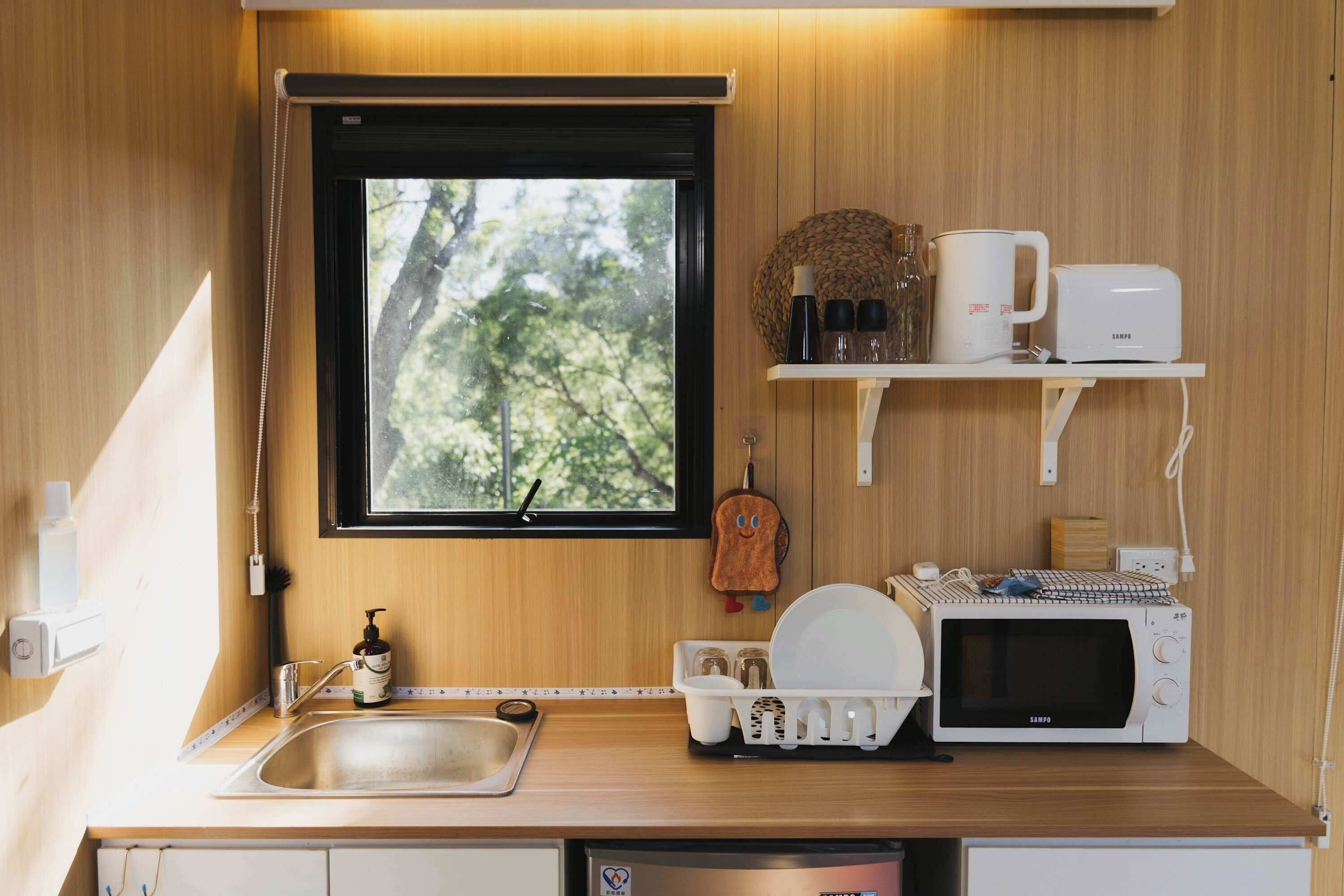 Fridge, microwave, stovetop, coffee/tea maker