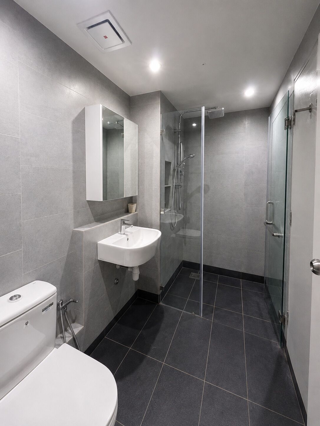 Shower, hair dryer, towels, toilet paper