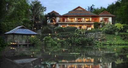 A private luxury retreat set in lush gardens and rice fields