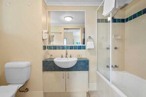 Hair dryer, towels, soap, shampoo