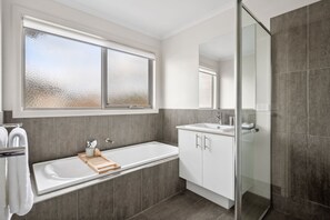 Shower, hair dryer, towels
