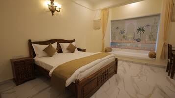 Deluxe Room, Resort View | Desk, laptop workspace, free WiFi