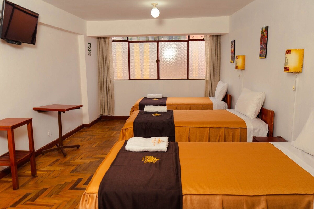 Triple Room, Garden View | Desk, laptop workspace, WiFi (free)