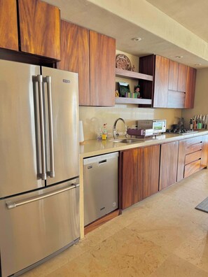 Fridge, microwave, dishwasher, coffee/tea maker