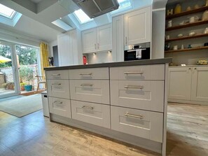 Coffee/tea maker, fridge, microwave, oven