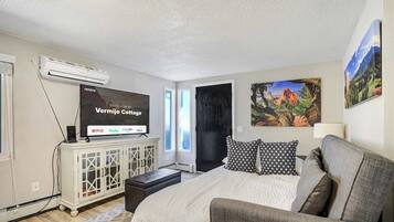 1 bedroom, desk, iron/ironing board, travel cot