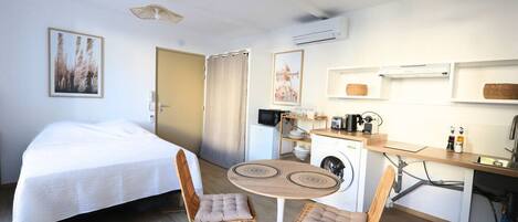 Iron/ironing board, travel crib, free WiFi, bed sheets