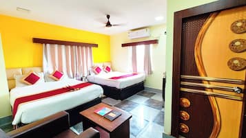 Deluxe Quadruple Room, Air conditioning, City View | In-room safe, soundproofing, free WiFi, bed sheets