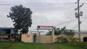 A gated entrance to a hotel with a sign reading "Crown Euro Inn." - Crow Euro Inn Hotel and Resort (Dhamrai)