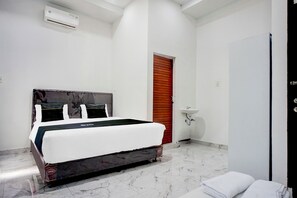 Suite estándar, 1 cama matrimonial | Escritorio, wifi gratis y ropa de cama