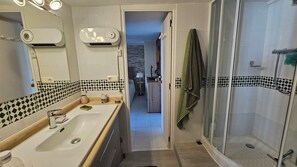 Hair dryer, towels, soap, toilet paper