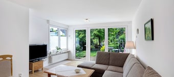 Appartement "Mit Garten" avec terrasse partagée et jardin privé