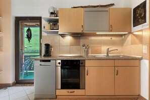 Réfrigérateur, four, plaque de cuisson, lave-vaisselle