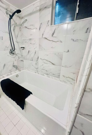 Hair dryer, towels, soap, shampoo