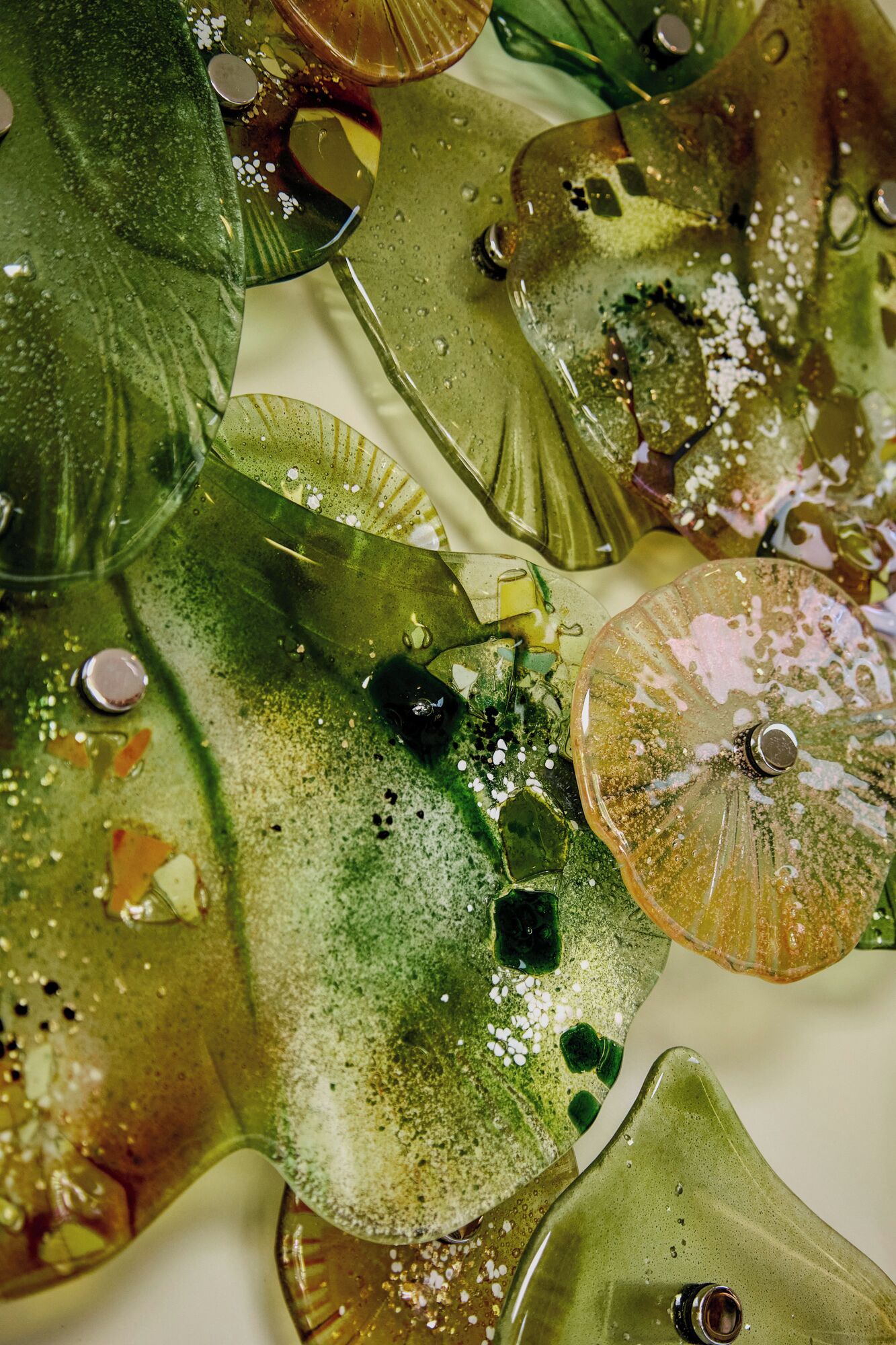 A close-up of decorative glass pieces with various shapes and textures.