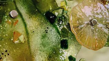 A close-up of decorative glass pieces with various shapes and textures.