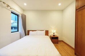 Deluxe Apartment, City View | Laptop workspace, blackout drapes, soundproofing, iron/ironing board