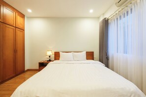Departamento Deluxe, vista a la ciudad | Espacio para trabajar con laptop, cortinas blackout y insonorización 