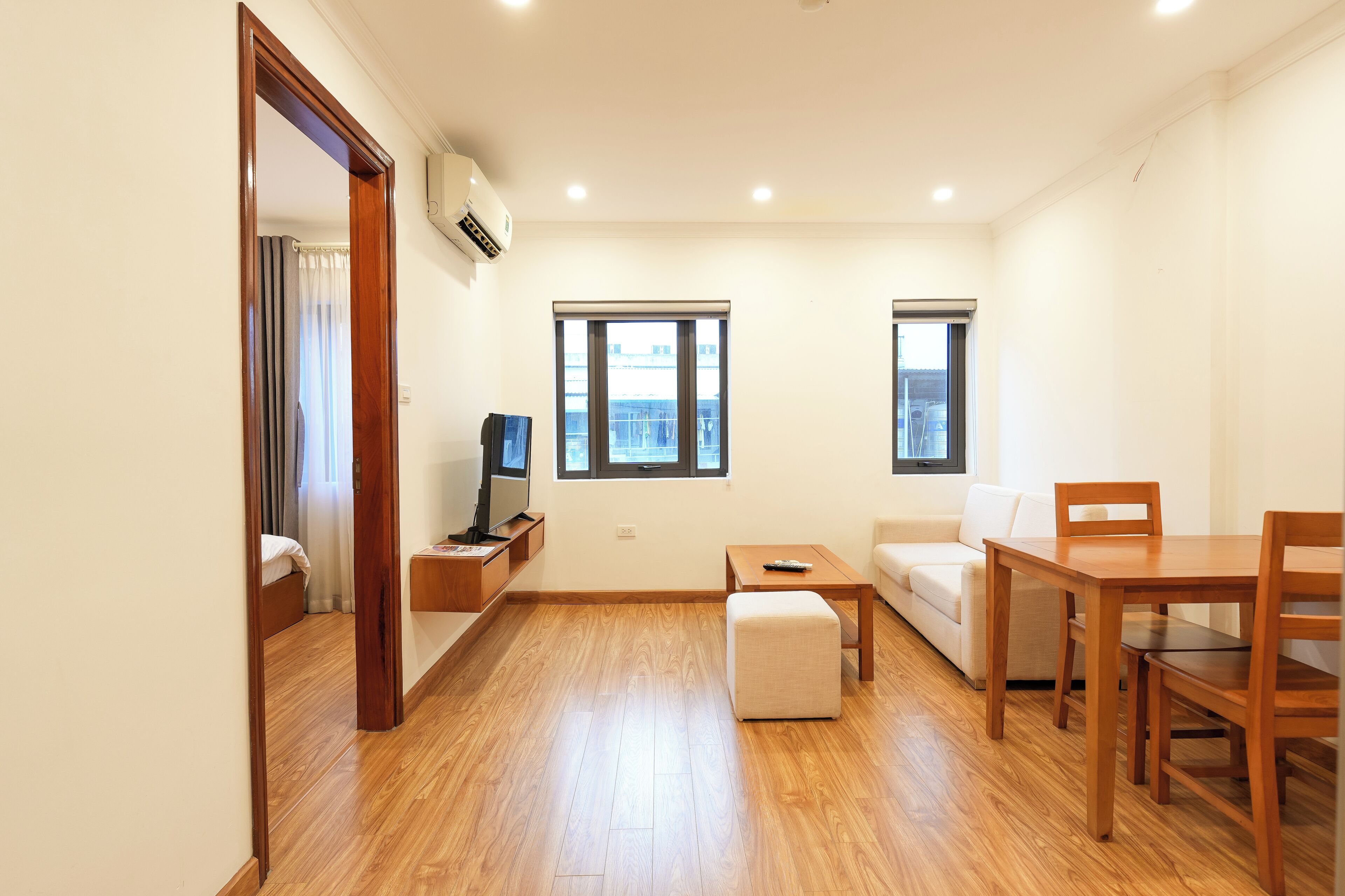 Deluxe Apartment, City View | Living area | Flat-screen TV, Netflix, streaming services