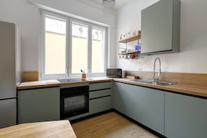 Comfort Apartment, City View | Private kitchen | Espresso maker, coffee/tea maker, electric kettle