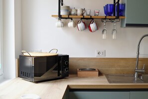 Comfort Apartment, City View | Private kitchen | Espresso maker, coffee/tea maker, electric kettle