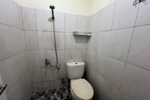 Habitación doble | Baño | Regadera, toallas, jabón 