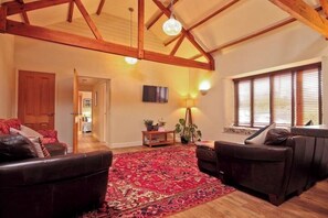 TV, fireplace - The Norfolk Farmhouse & Barn, (sleeps18) - close to coast with hot -tub. (Felmingham)
