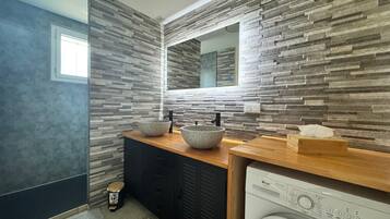 Shower, hair dryer, towels, soap