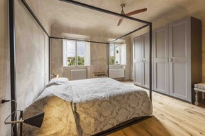 2 habitaciones y tabla de planchar con plancha 