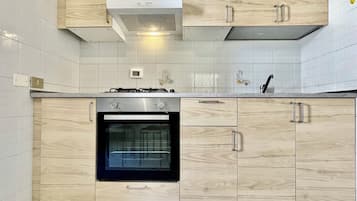 Fridge, stovetop, coffee/tea maker, cookware/dishes/utensils