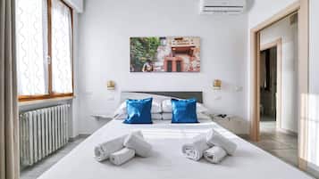 2 habitaciones, tabla de planchar con plancha y cuna de viaje