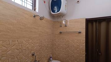Shower, towels, soap, toilet paper