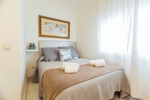 Apartamento familiar | Tabla de planchar con plancha y wifi gratis
