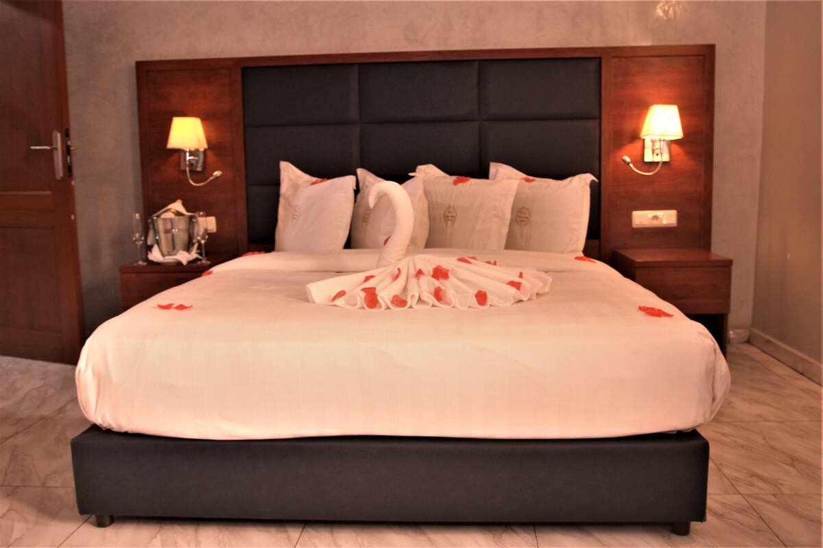 Suite, Balcony | 1 bedroom, in-room safe, desk, laptop workspace