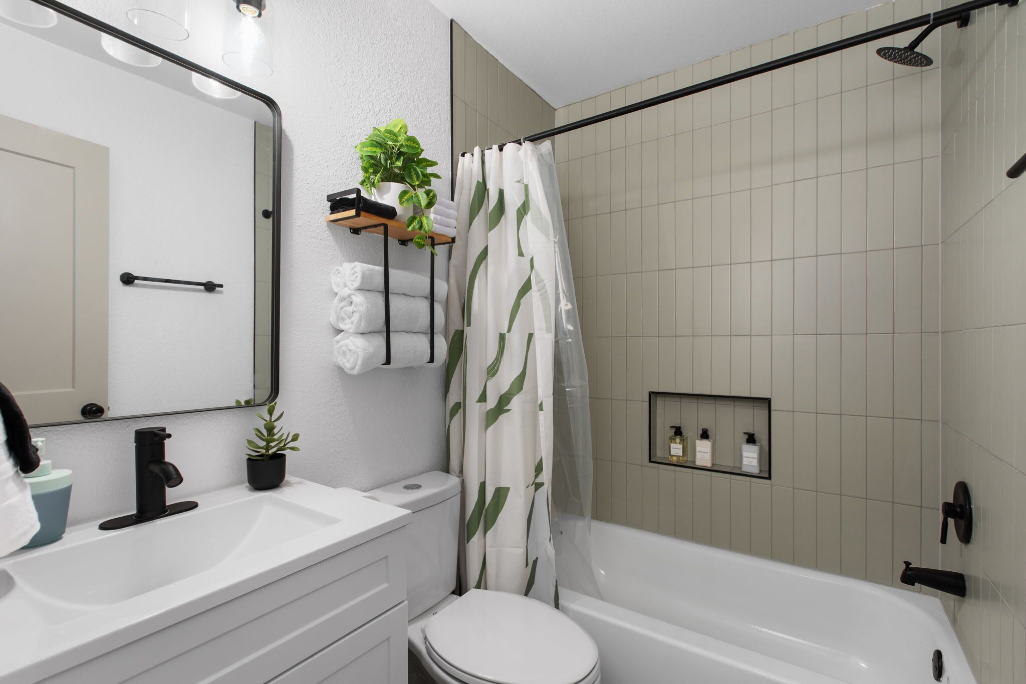 Shower, hair dryer, towels, shampoo