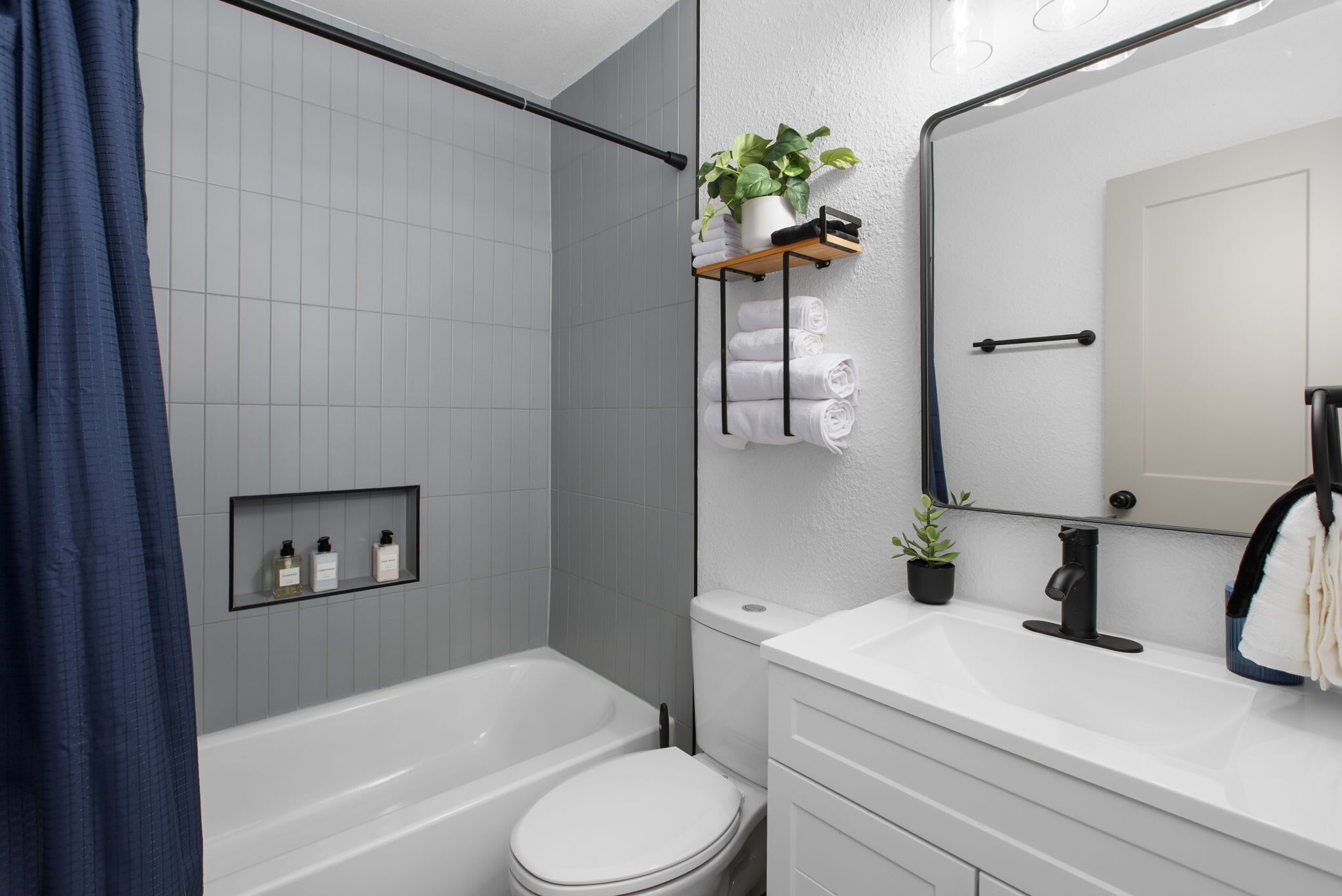Shower, hair dryer, towels, shampoo