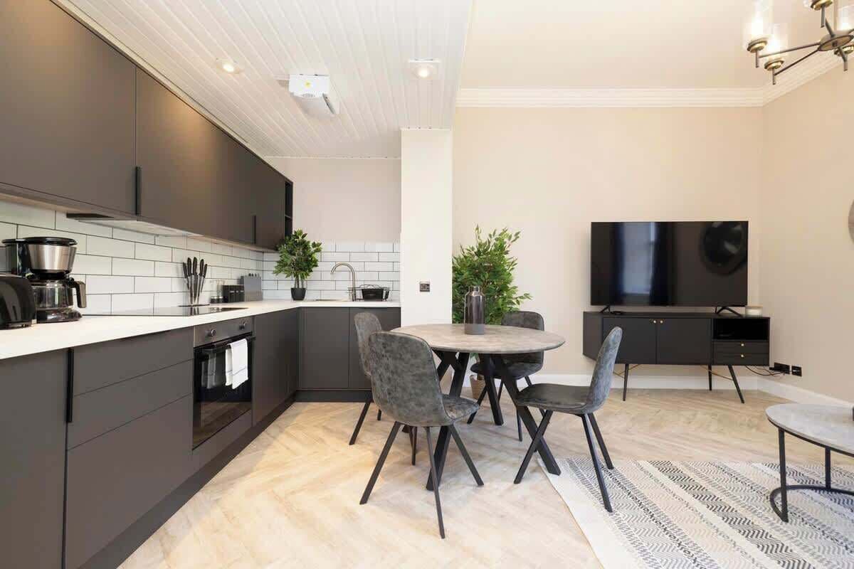 Departamento, vista a la ciudad | Cocina privada