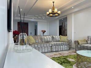 Family Apartment, Balcony, City View | Living area - MARCY SUITES BASTOS (Yaounde)
