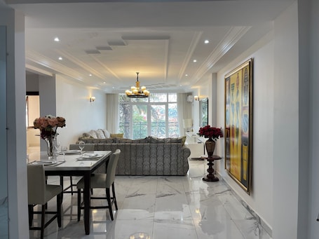 Apartamento familiar, balcón, vistas a la ciudad | Zona de estar. MARCY SUITES BASTOS