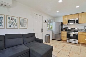 Fridge, stovetop, coffee/tea maker, cookware/dishes/utensils