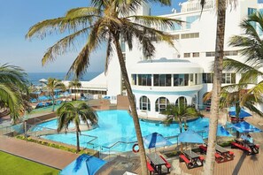 A heated pool - Ocean-View Penthouse | Hot Tub | Spa | Patio (Ballito)