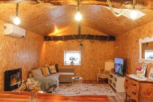 Family House, Garden View | Living area | 10-inch flat-screen TV with cable channels