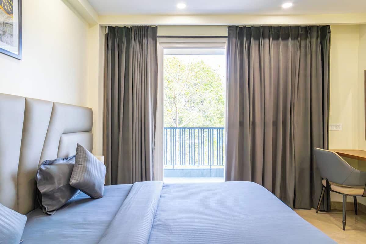 In-room safe, desk, laptop workspace, blackout curtains